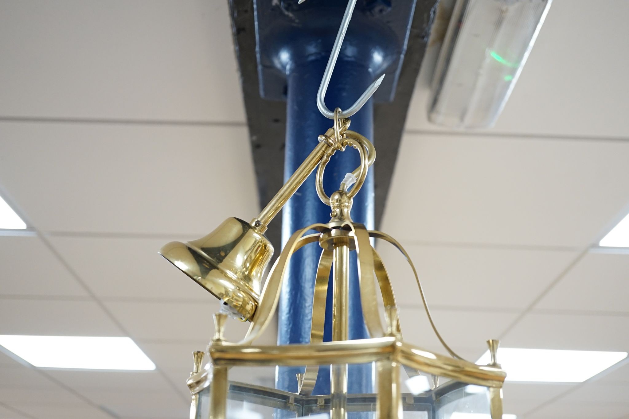 A brass hanging hall lantern